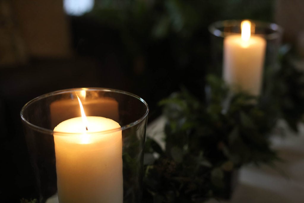 Candles gave their warm light to every corner of the room
