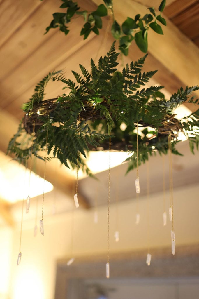 One of the quartz crystal-emblazoned fern and vine chandeliers we hung for the party
